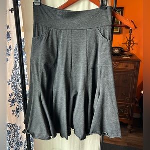 Dark grey just above the knee skirt